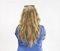 Beautiful blonde woman back portrait. Isolated over white background. Royalty Free Stock Photo