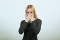 Upset Girl Covered Mouth With Her Hands, Is Silent. The Concept Of Suspicion Royalty Free Stock Photo