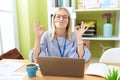 Young blonde woman business worker doing yoga exercise at office Royalty Free Stock Photo