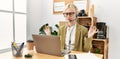 Young blonde woman business worker doing yoga exercise at office Royalty Free Stock Photo