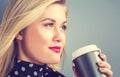 Young blonde woman drinking coffee Royalty Free Stock Photo