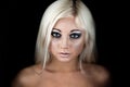 Young blonde woman face with dark makeup Royalty Free Stock Photo