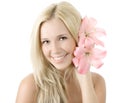 Young blonde woman with lily smile isolated Royalty Free Stock Photo