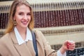 Young blonde woman makes a wish at the Prague Chezh Fountain Royalty Free Stock Photo