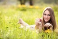 Young blonde woman on the meadow Royalty Free Stock Photo