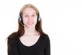 Young blonde woman over isolated white background working with headset in call center office with copy space Royalty Free Stock Photo