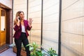 Business woman laughing by mobile phone Royalty Free Stock Photo