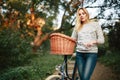 Young blonde woman on a vintage bicycle Royalty Free Stock Photo