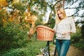 Young blonde woman on a vintage bicycle Royalty Free Stock Photo