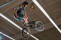 Young BMX Rider Doing Extreme Tricks on Bike in the Skatepark. Healthy and Active Lifestyle.