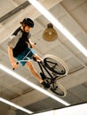 Young BMX Rider Doing Extreme Tricks on Bike in the Skatepark. Healthy and Active Lifestyle.