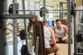 Young bodybuilder in gym.