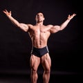 Young bodybuilder posing Royalty Free Stock Photo