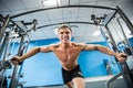 Young Bodybuilder Is Working On His Chest With Cable Crossover In Gym. Royalty Free Stock Photo