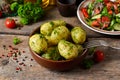 Young, boiled potatoes with butter and dill