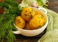 Young boiled potatoes, organic cooked breakfast harvest dill background, vegetarian garlic natural