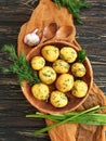 Young boiled potatoes, organic dill background, vegetarian garlic natural