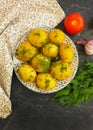 Young boiled potatoes, organic cooked breakfast dill background, vegetarian garlic natural