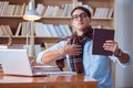 The young book writer writing in library Royalty Free Stock Photo