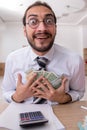 Young male bookkeeper in budget planning concept Royalty Free Stock Photo