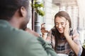 Young bored girl drinking coffee on date at a cafe Royalty Free Stock Photo