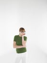 Young Bored Woman In Glasses And Green Tshirt