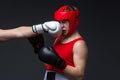 Young boxer is being punched Royalty Free Stock Photo