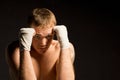 Young boxer in the defensive position