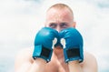 Young boxer. Man in boxing gloves. Sport lifestyle. Sport motivation. Full concentration. Dare to be great. Handsome Royalty Free Stock Photo