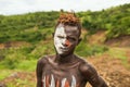 Young boy from the African tribe Mursi, Ethiopia Royalty Free Stock Photo