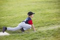 Young boy baseball player waiting on third base