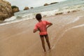 Young boy on beach, Biarritz, France