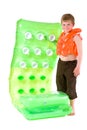 Young boy with beach mattress Royalty Free Stock Photo