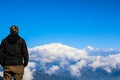 The young boy in the black dress is in the happiness of the young man in the clouds of clouds