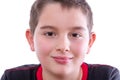 Young Boy in Black and Red Shirt Smiling at Camera Royalty Free Stock Photo