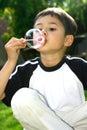 Young boy blowing bubble Royalty Free Stock Photo