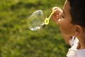 Young Boy Blowing Bubbles Royalty Free Stock Photo