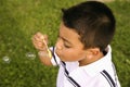 Young Boy Blowing Bubbles Royalty Free Stock Photo