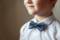 Young boy with blue bow tie Royalty Free Stock Photo