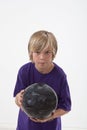 Young boy bowling Royalty Free Stock Photo