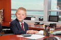 Young Boy in Business Office Royalty Free Stock Photo