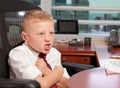 Young Boy in Business Office Royalty Free Stock Photo