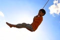 Young boy on chain swing