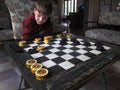 Young Boy Checkers - Wakulla Lodge