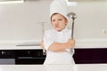 Young boy chef protecting his secret recipe