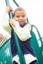 Young Boy On Climbing Frame In Playground Royalty Free Stock Photo