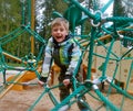 Young Boy Climbing Playground Structure Royalty Free Stock Photo