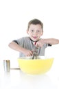 Young boy cooking Royalty Free Stock Photo
