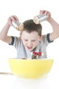 Young boy cooking Royalty Free Stock Photo