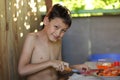 Young boy cooking Royalty Free Stock Photo